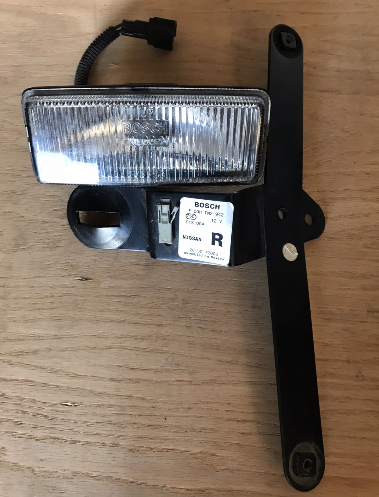 Nissan frontier and Xterra fog light weight bracket only one for Sale