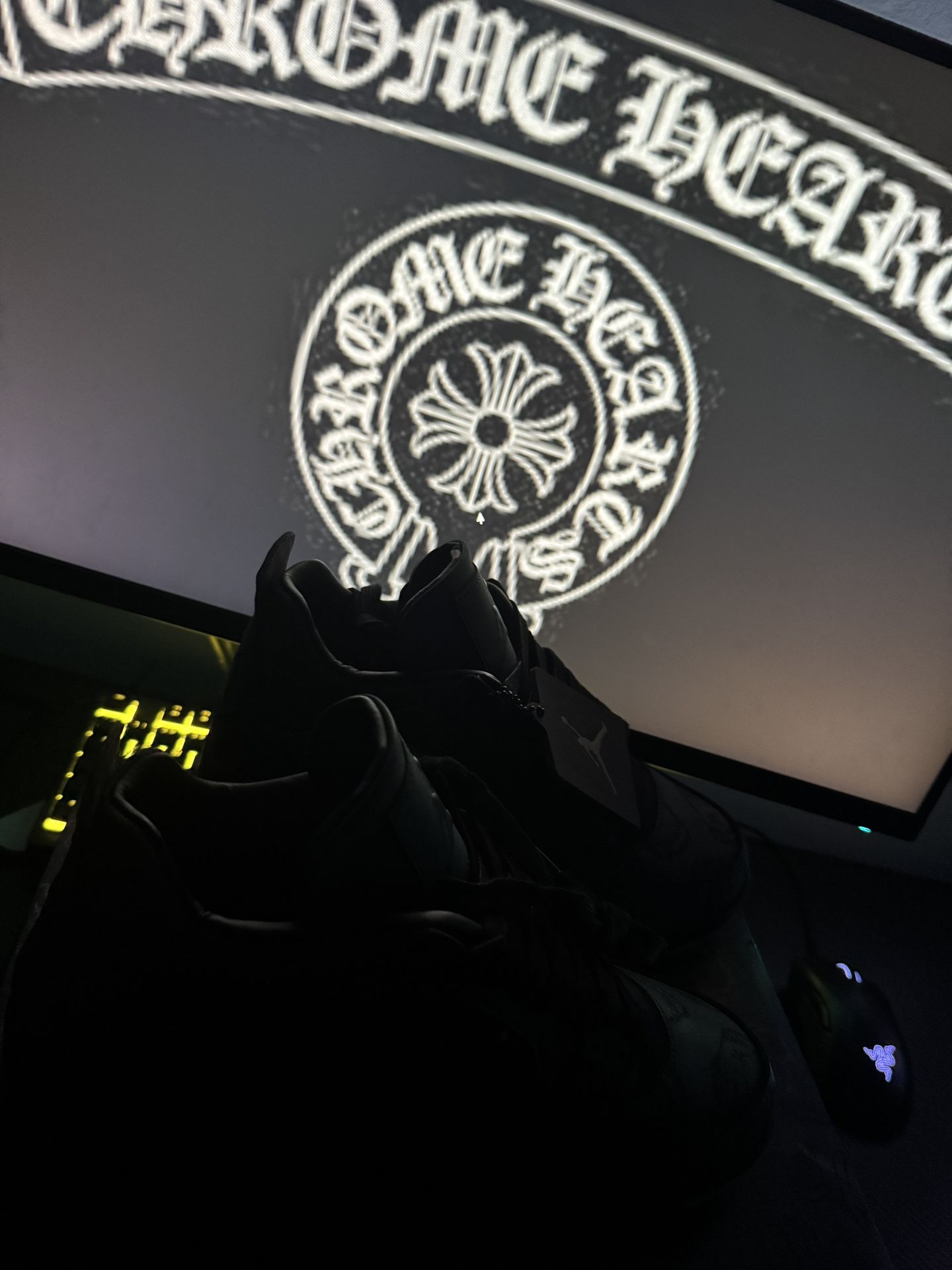 Jordan 4 Kaws Black Limited Edition.