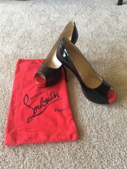 Brand new authentic Christian Louboutin Peep toe pumps