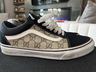 custom-made Vans Old Skool sneakers featuring a handmade modification with Gucci's