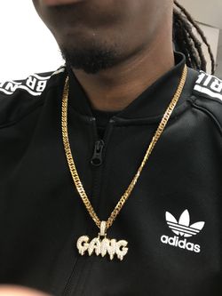 Iced out gang pendant with Cuban link chain