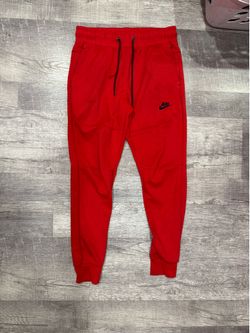 Red Nike sweats