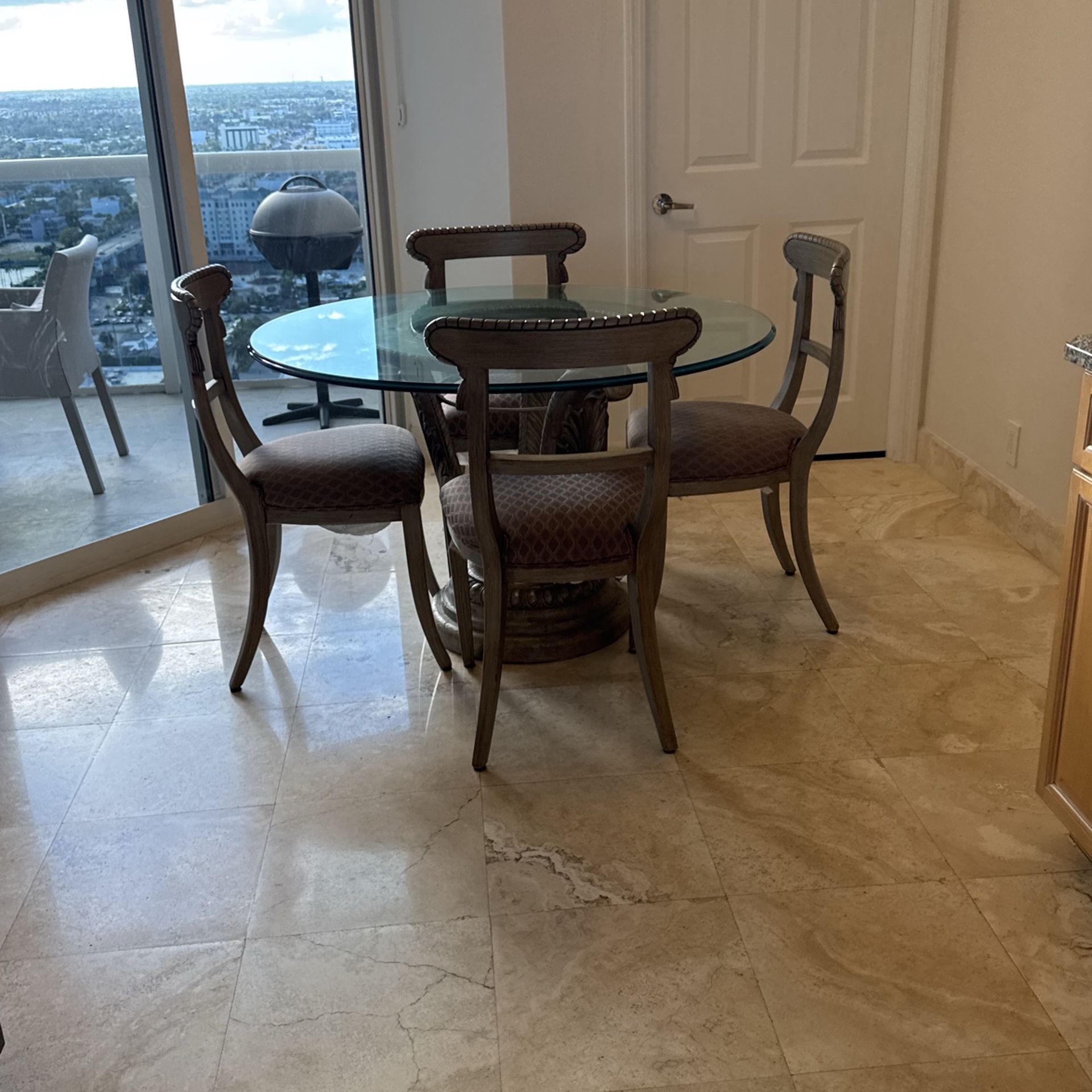 Chairs With A Glass Table