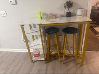 Bar height table with 2 stools