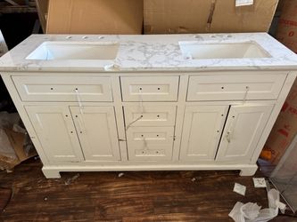 Vanity with broken top one broken sink brand new never installed yet has scratches