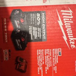 Two Brand New M18 Milwaukee Batteries And Charger 