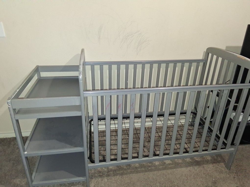 Baby CRIB W/CHANGING STATION AND SHELVES