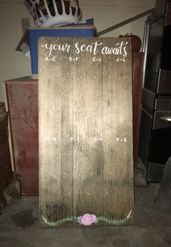 Wood board wedding seating chart