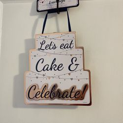 Eat cake and celebrate sign