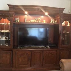 4 pieces Entretainment Center wall with power center holds 67 TV Measures 10ft long 7ft 4 in high