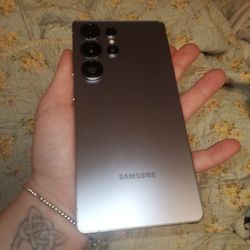 Samsung Galaxy S25 in blue/silver.    512 GB of storage, unlocked to any carrier.