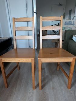 Pair of IKEA JOKKMOKK Wooden Chairs (Set of 2) Color / Material: Antique Varnish, Solid Pine