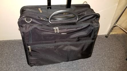 Brief case with wheels it fits 17 inch computers