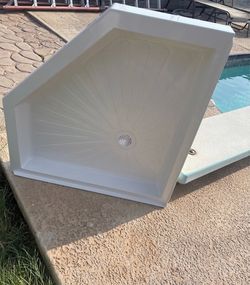 Corner shower base