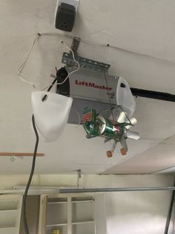 Garage Door Opener Spring Off Track Adjustment Replace And Parts