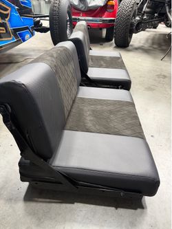 Fold up chairs for trailer or race hauler.