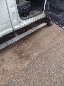 Amp research drop down hide away truck steps
