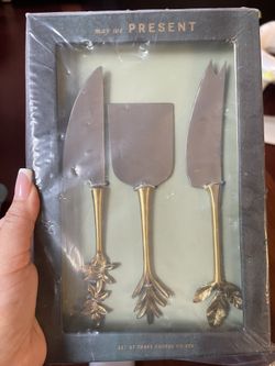 Anthropologie- set of 3 cheese knives 