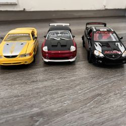 Diecast Cars 1/24 Scale Lot Of 3 Cars Acura Mustang And Eclipse Spyder With Extra Parts Asking 30 Dollars 