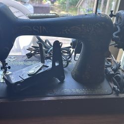 Two Singer Sewing Machines. One Older, One Newer. 