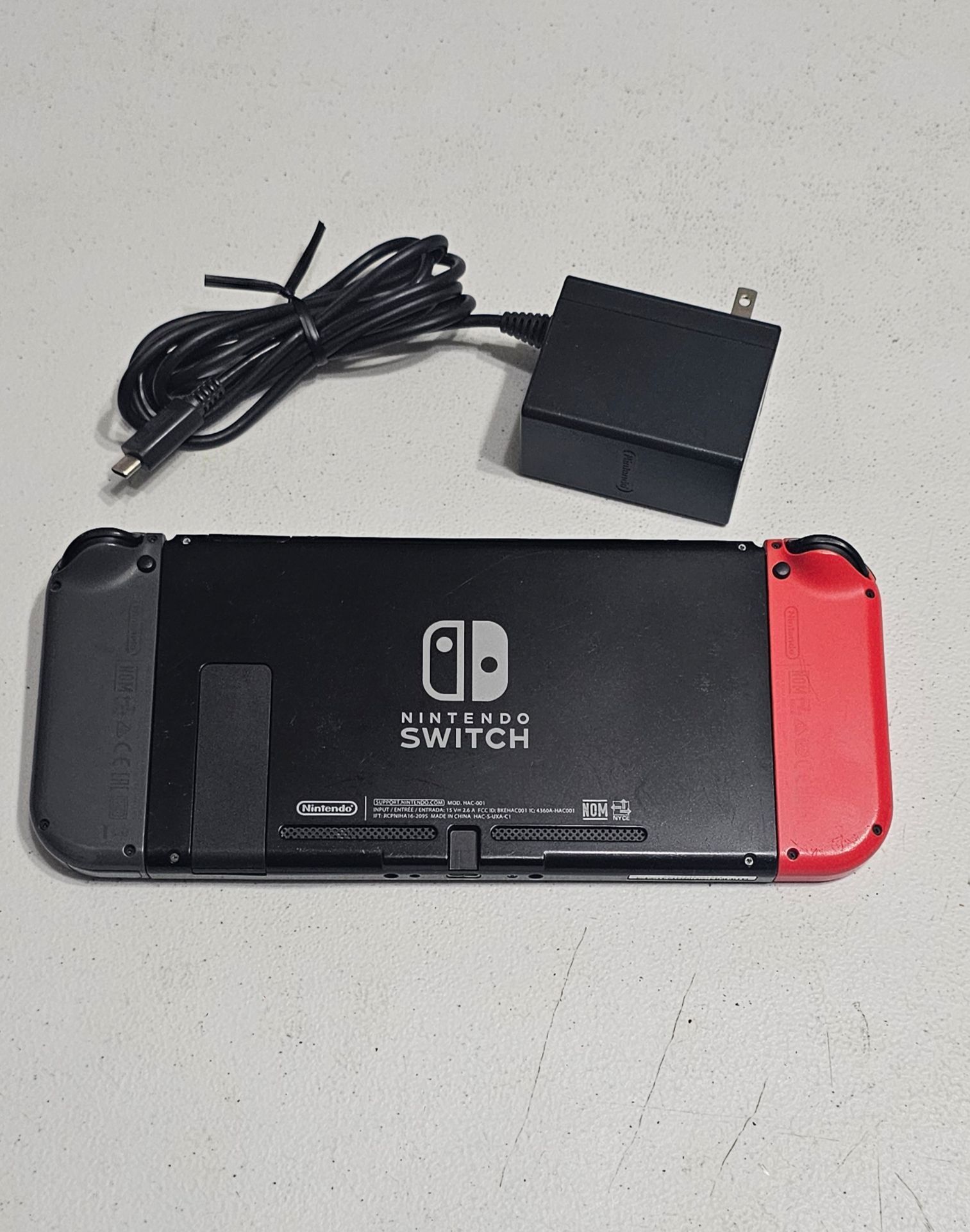 Nintendo Switch with Red and Gray Joy-Cons for Sale in Ridgefield