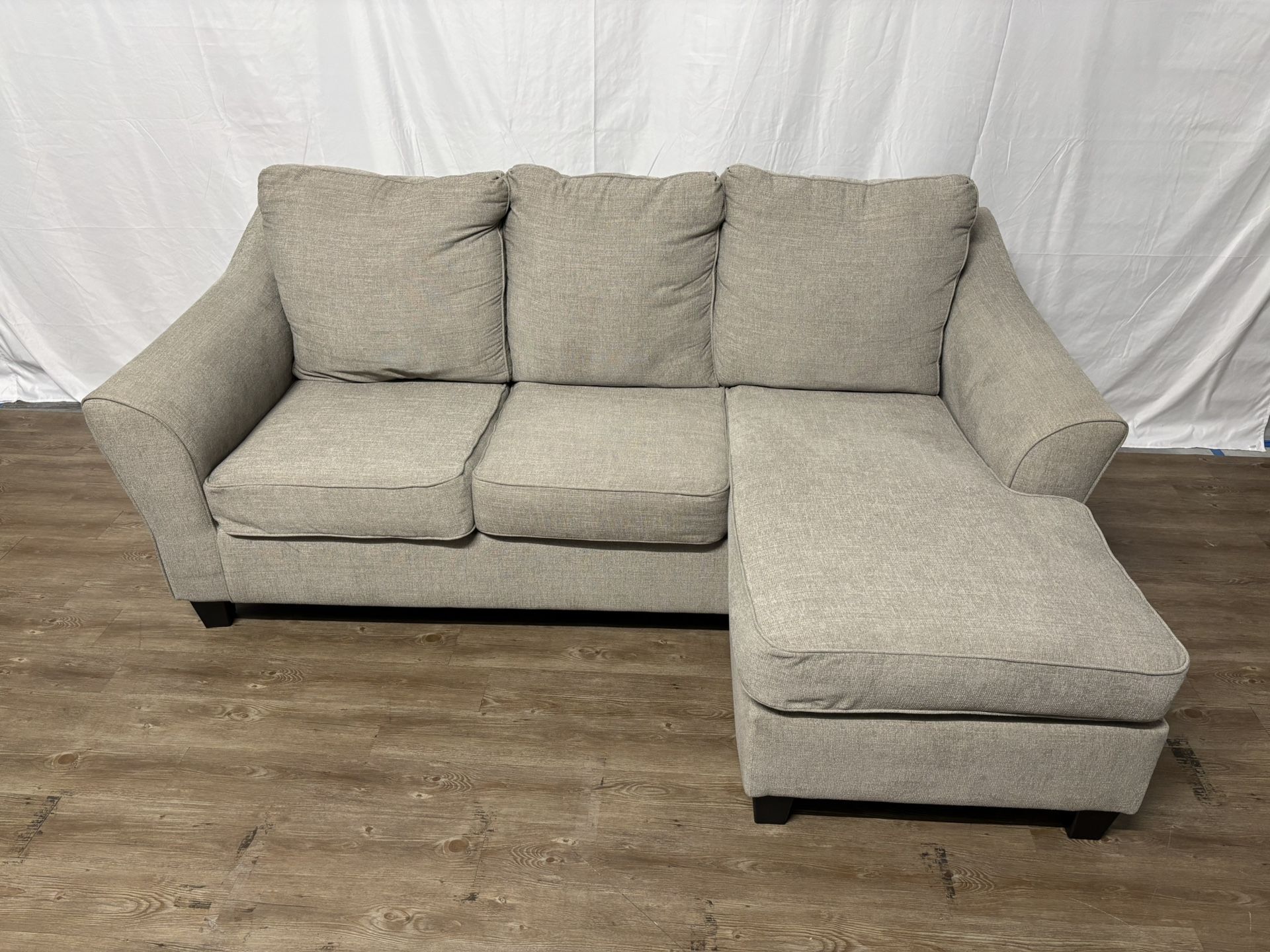 Beige Couch With Reversible Chaise