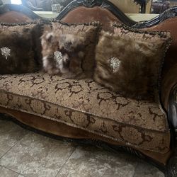 Sofa and matching chair with decorative Pillows! 