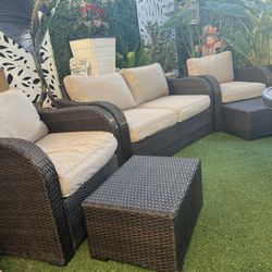 Beautiful rattan patio set in very good condition with no damage. The cushions are Sunbrella.