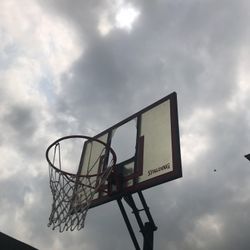 Spalding Basketball hoop. Cracked Back Board 