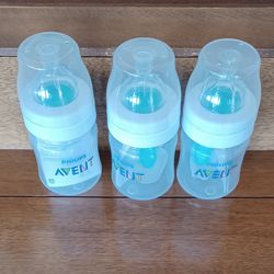 2 Kinds Of Baby Bottles 4oz Each, $3.00