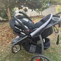 Graco Fast Action jogger With Car Seat And Base