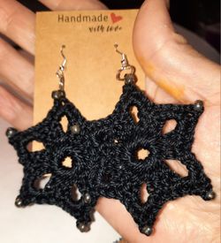 Black star shaped earrings 