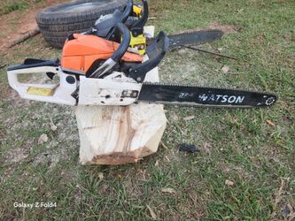 2 chainsaws