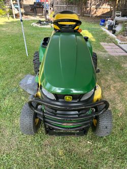 John Deere X304 Riding Lawn Mower – 4-Wheel Steering