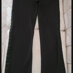 PUMA Brand Women's Leggings Size Medium. (  PUMA Designs On Both Sides Of The Leggings)