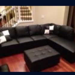Black Leather Sectional Couch And Storage Ottoman