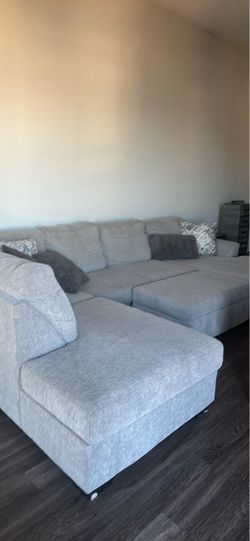 Sectional couch with ottoman