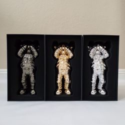 Kaws Holiday Space Set (Black, Gold, Silver)