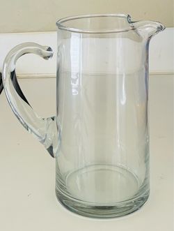 Glass pitcher, 9” tall, 6” wide.