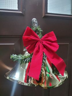 Festive Christmas Gold Plastic Bell Door Hanger With Red Bow And Green Branches