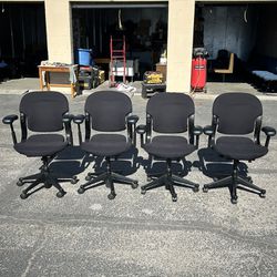 4 Office Chairs With Wheels- $20 Each 