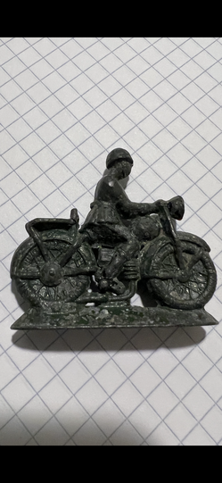 military man on a motorcycle of the USSR 50-70 years old material tin metal