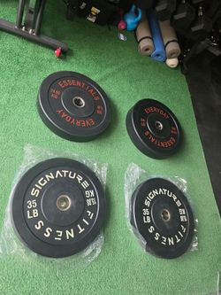 Bumper plates bybdled. Gym equipment