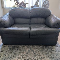 LEATHER LOVESEAT COUCH -GOOD CONDITION