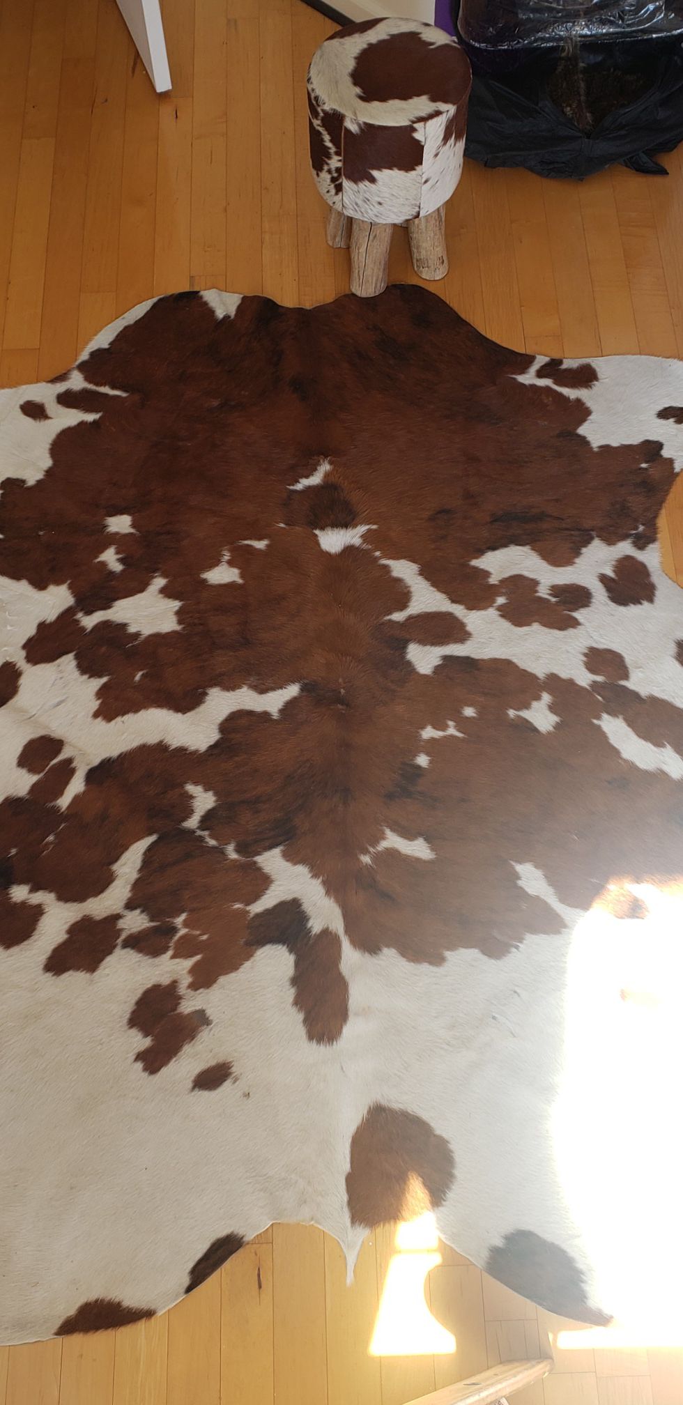 Cow hide 5x7 area rug and stool