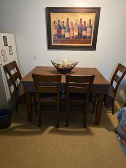 Solid oak table with 4 chairs & bench!