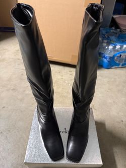 Black knee high boots