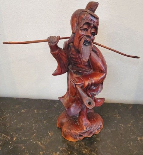 Fisherman Handcarved with Pipe & Pole