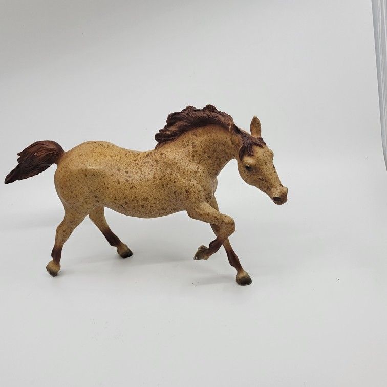 Breyer Running Stallion 128 #19 Traditional 1 Semigloss Vintage
Red Roan.
It is a vintage collectible horse figure made of plastic in the Uni