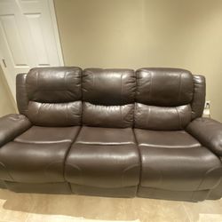 Couch with 2 built in recliners 